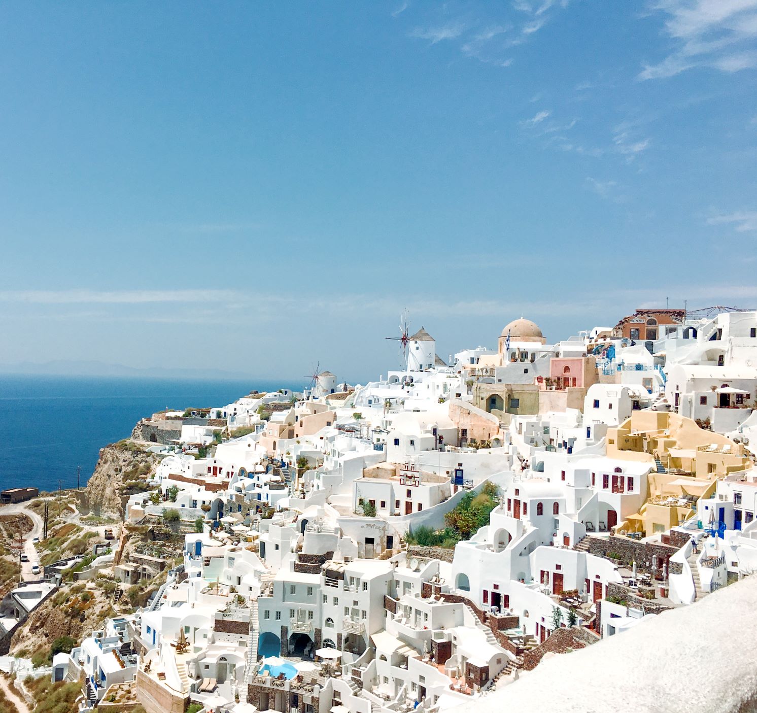 The most iconic shot of Santorini is in Oia, where white buildings shine in the sun. The sunny island is one of the best vacation spots for any traveler.