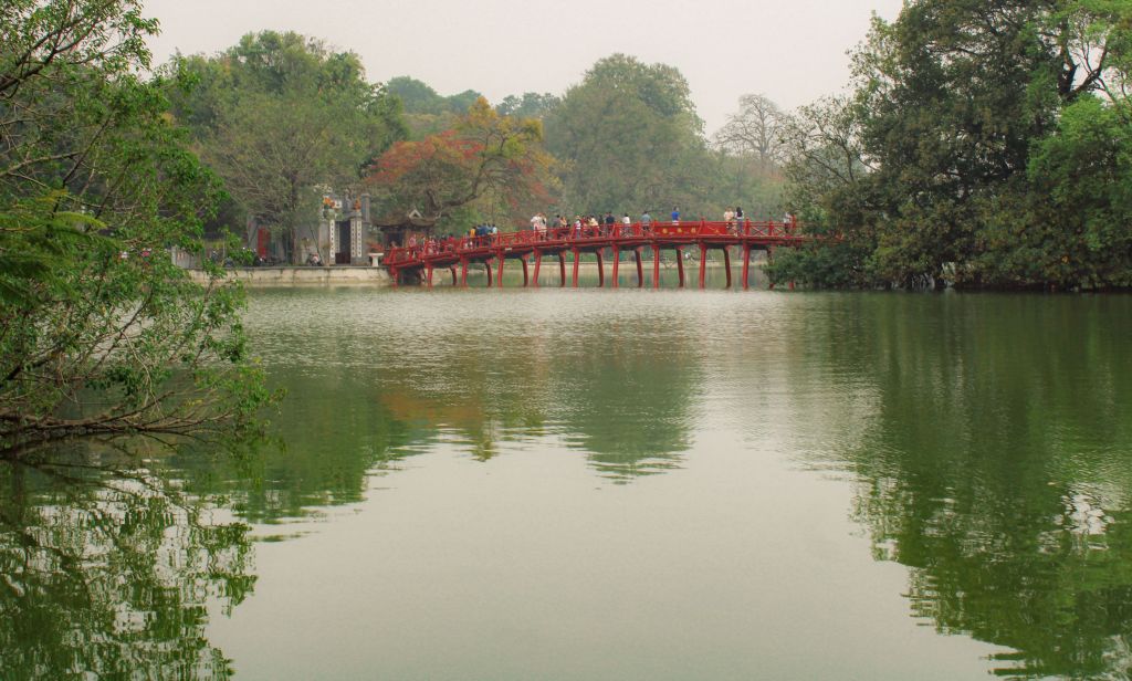 The Huc Bridge, also known as the Red Bridge, is an iconic sight to see in Vietnam. It connects the bank of Hoan Kiem Lake to the sacred Buddhist Ngoc Son Temple.